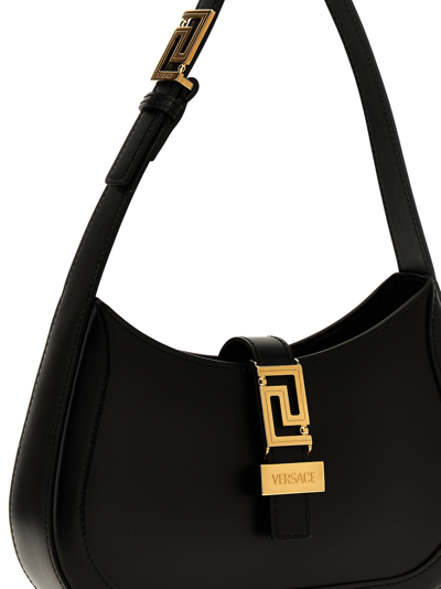 Shop Versace Greca Goddess Small Shoulder Bag In Black