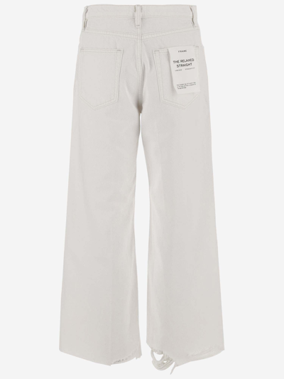 Shop Frame Wide Leg Jeans In White New Chew