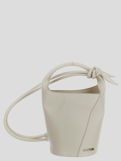 Shop Jacquemus Mini Knotted Bucket Bag In White
