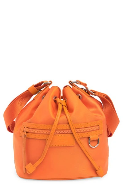 Shop Longchamp Small Le Pliage Neoprene Bucket Bag In Orange
