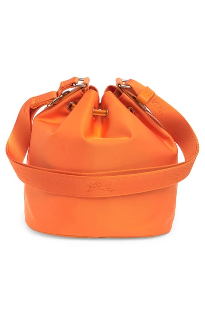 Shop Longchamp Small Le Pliage Neoprene Bucket Bag In Orange