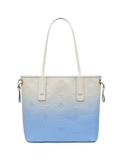 Shop Mcm Women's Liz Monogram Embossed Leather Shopper Bag In Della Robbia Blue