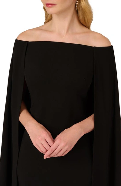 Shop Adrianna Papell Off The Shoulder Long Sleeve Capelet Cocktail Dress In Black
