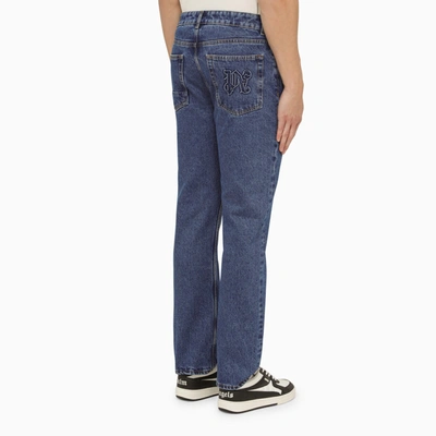 Shop Palm Angels Blue Jeans With Monogram Embroidery