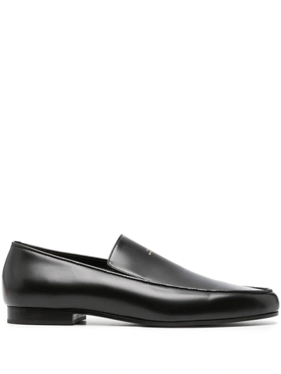 Shop Totême Loafers In Black