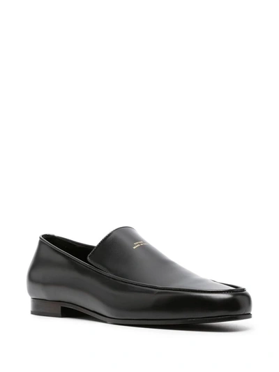 Shop Totême Loafers In Black