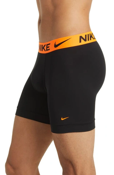 Shop Nike 3-pack Dri-fit Essential Micro Boxer Briefs In Black Multi Flt