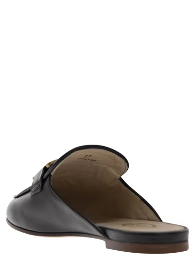 Tod's Glossy Black Slippers With Logo Plaque