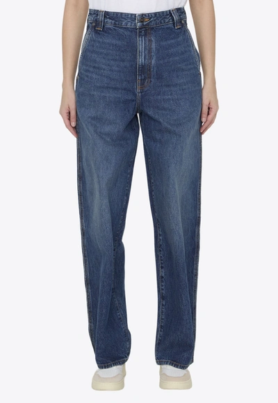 Shop Khaite Bacall Washed-out Jeans In Blue