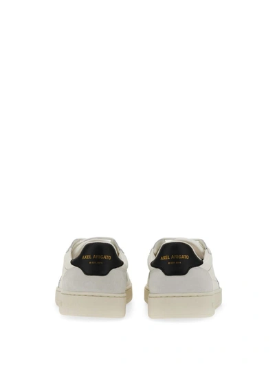 Shop Axel Arigato Sneaker With Logo In White