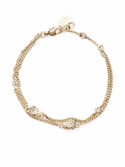Shop Alexander Mcqueen Skull Multi Chain Bracelet In Golden