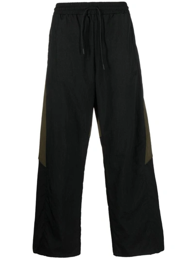 Shop Reebok Pants Clothing In Black