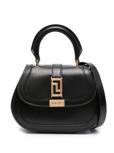 Shop Versace Hand Held . Bags In Black