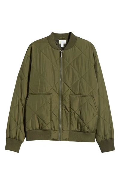 Shop Zella Quilted Side Zip Bomber Jacket In Olive Night