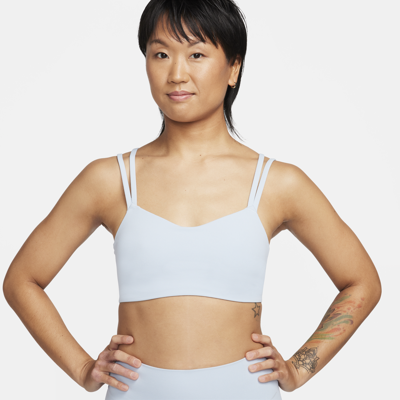 Shop Nike Women's Zenvy Strappy Light-support Padded Sports Bra In Blue