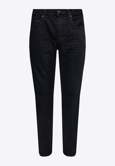 Shop Saint Laurent Basic Tapered-leg Jeans In Black