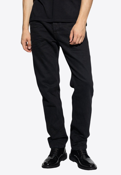 Shop Saint Laurent Basic Tapered-leg Jeans In Black