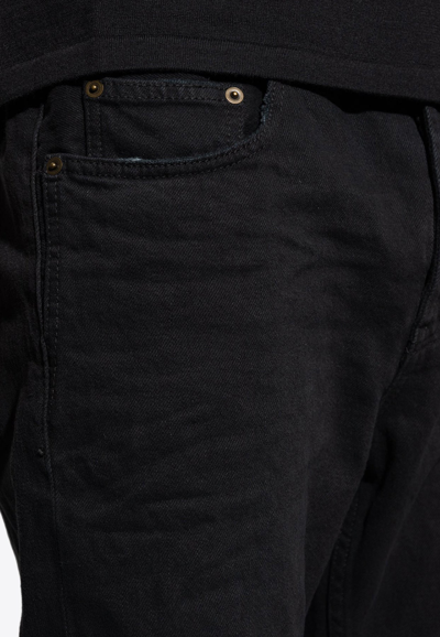 Shop Saint Laurent Basic Tapered-leg Jeans In Black
