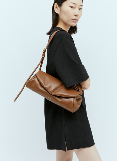 Shop Jil Sander Women Large Cannolo Padded Shoulder Bag In Brown