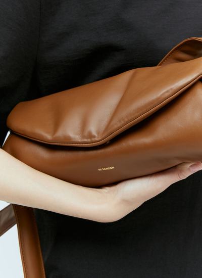 Shop Jil Sander Women Large Cannolo Padded Shoulder Bag In Brown