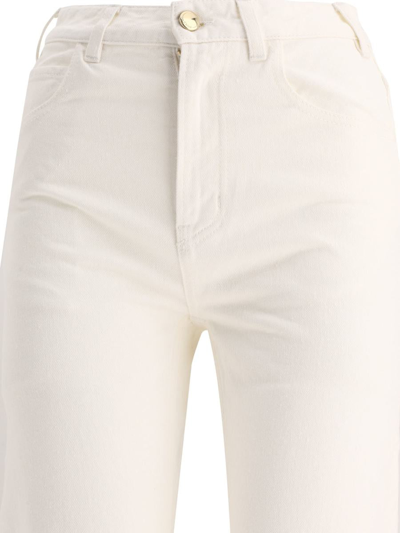Shop Chloé Flare Boyfriend Jeans In White