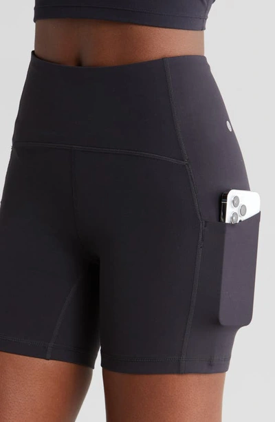 Shop Zella Studio Luxe Pocket Bike Shorts In Black