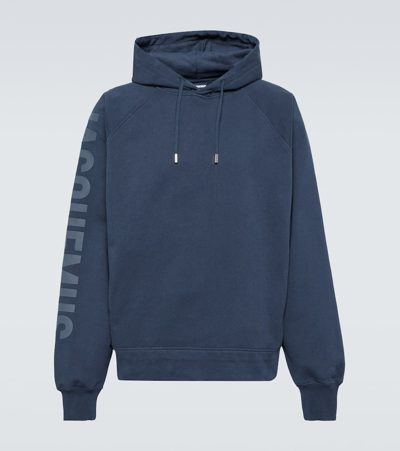 Shop Jacquemus Le Typo Cotton Jersey Hoodie In Blue