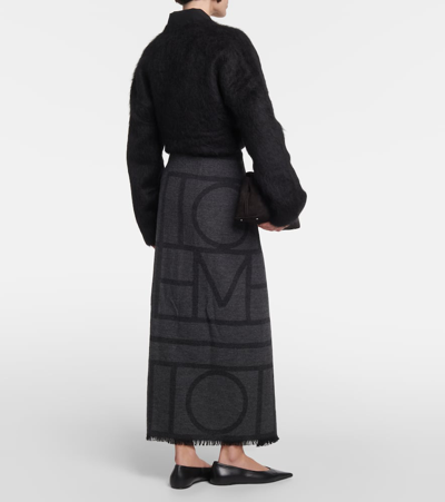 Shop Totême Logo Embroidered Wool Maxi Skirt In Grey