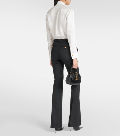 Shop Versace High-rise Wool-blend Flared Pants In Black