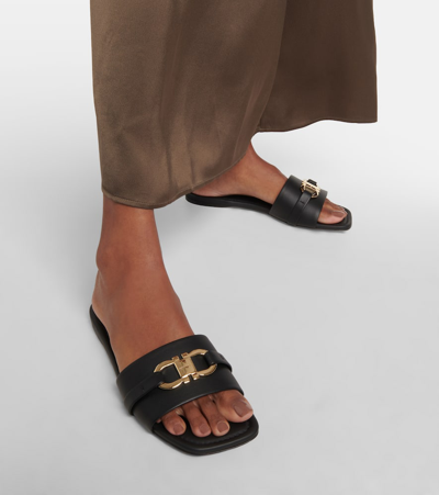 Ferragamo Leather Slides With Flat Sole And Gold-tone Hardware In Black