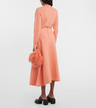 Shop Jil Sander High-rise Asymmetric Wool Midi Skirt In Orange