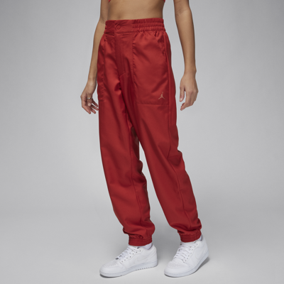 Shop Jordan Women's  Woven Pants In Red
