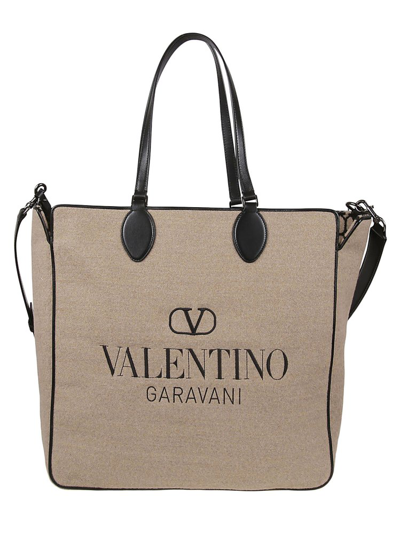 Shop Valentino Logo Embroidered Top Handle Bag In Beige