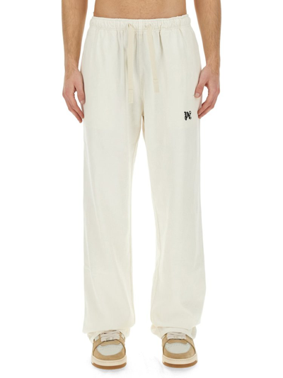 Shop Palm Angels Monogram Embroidered Drawstring Pants In White