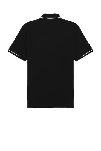 Shop Moncler Short Sleeve Polo In Black