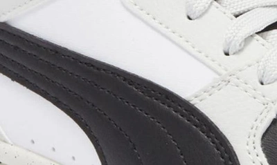 Shop Puma Rebound Joy High Top Sneaker In  White- Black-gray