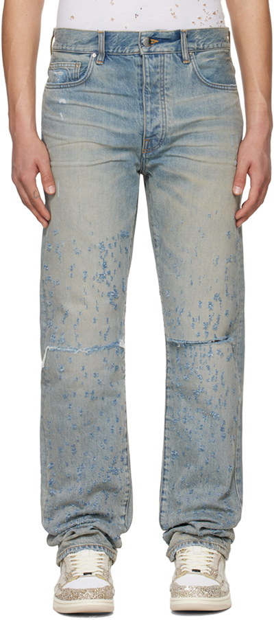 Amiri Light Blue Destroyed Straight Jeans With Cut-out In Cotton Denim Man In Antique Indigo