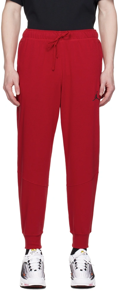 Shop Nike Red Dri-fit Sportwear Crossover Sweatpants In Gym Red/black