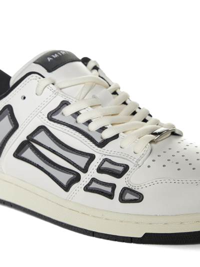 Shop Amiri Sneakers In White/black