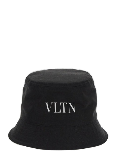 Shop Valentino Vltn Logo Printed Bucket Hat In Black