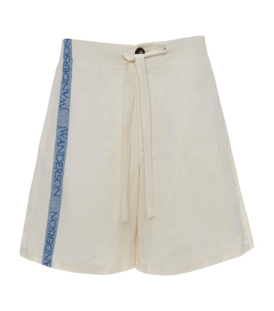 Shop Jw Anderson Cotton-linen Logo Stripe Shorts In Neutrals