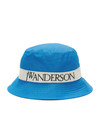 Shop Jw Anderson Embroidered Logo Bucket Hat In Blue