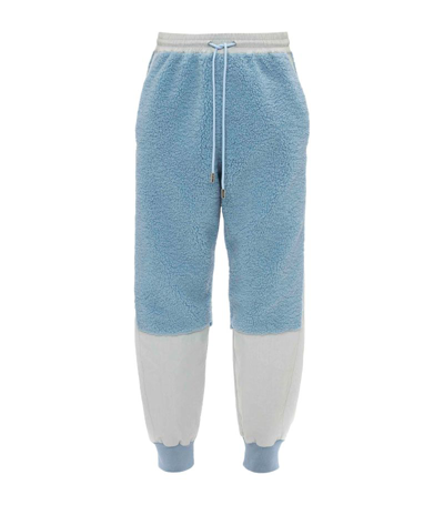 Shop Jw Anderson Fleece Colour-block Sweatpants In Blue