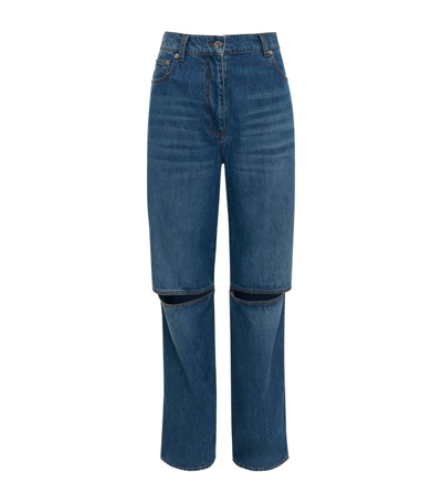 Shop Jw Anderson Cut-out Bootcut Jeans In Blue