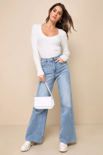 Shop Vervet Olivia Light Wash Super High Rise Wide-leg Raw Hem Jeans In Blue