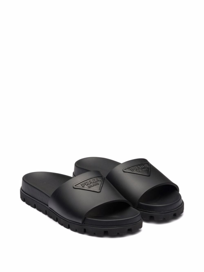 Shop Prada Rubber Slider Sandals In Black