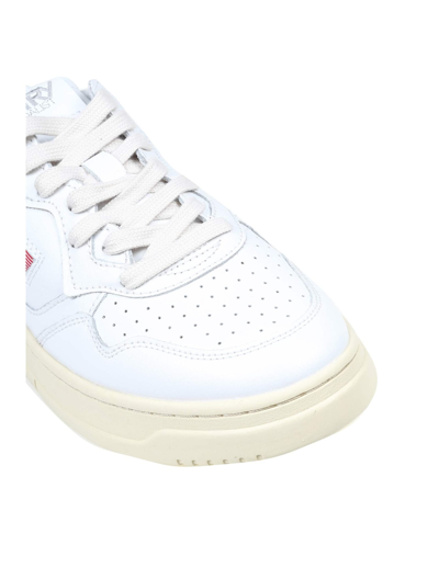 Shop Autry Sneakers In White Leather In White/red