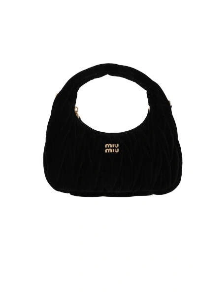 Shop Miu Miu Wander Matelassé Zip In Black