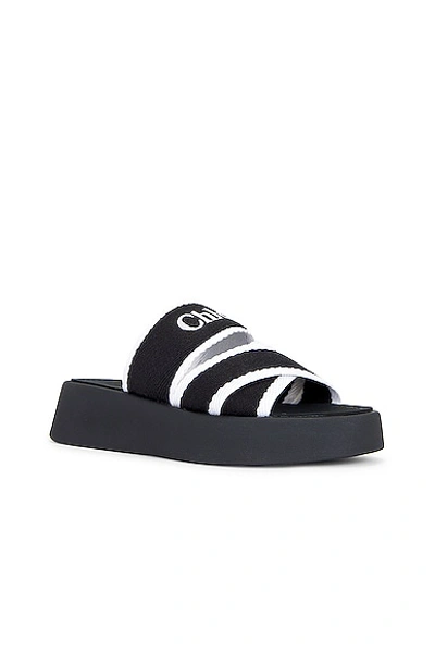 Shop Chloé Mila Sandal In Black & White