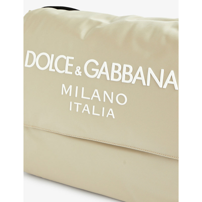 Shop Dolce & Gabbana Brand-print Slip-pocket Shell Changing Bag In Beige/white